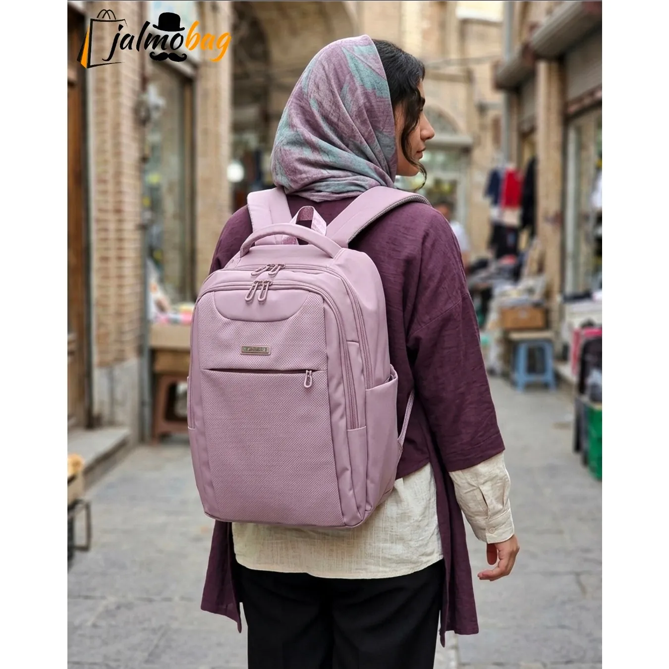 کوله پشتی پاستیلی پریزیدنت جادار ضد خش دارای جای لپ تاپ و دسته چمدان